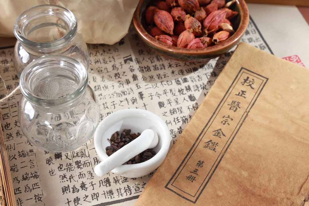 herbal tincture bottle and cup for preparation