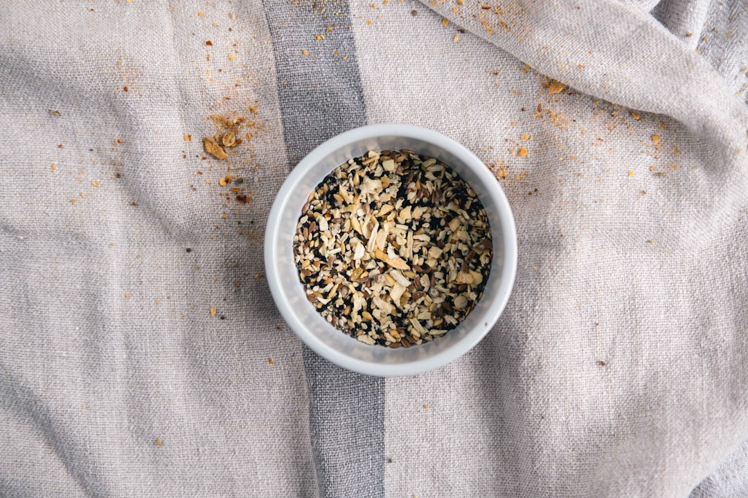 Hemp seeds in a bowl — the chief ingredient in ma zi ren wan for constipation