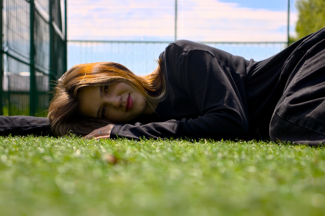 Woman resting outdoors representing recovery from fatigue with gui pi tang