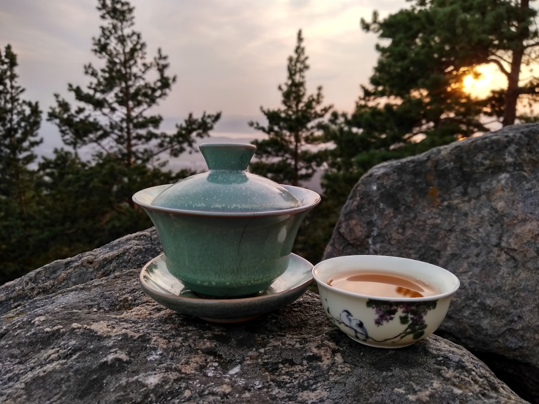 Tea cup with classical chinese immune formula brewing in warm water.