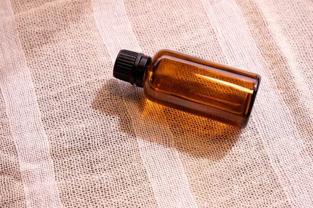Amber dropper bottle of saw palmetto tincture for prostate health support