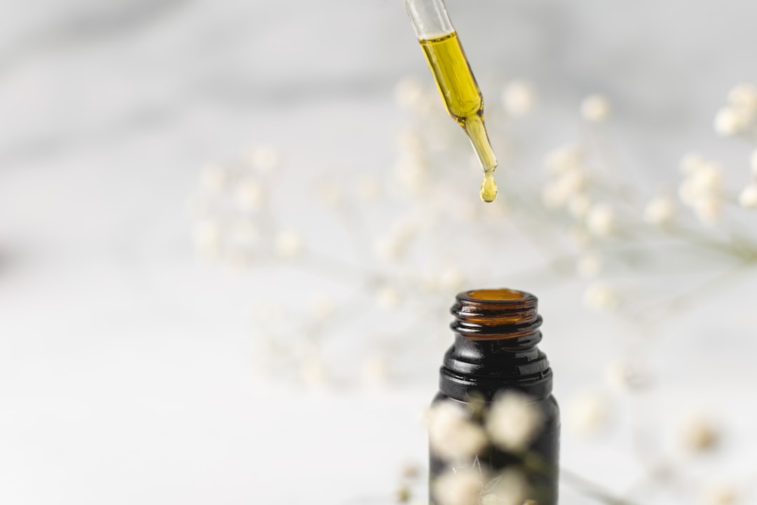 Amber glass tincture bottle representing schisandra berry liver and energy support