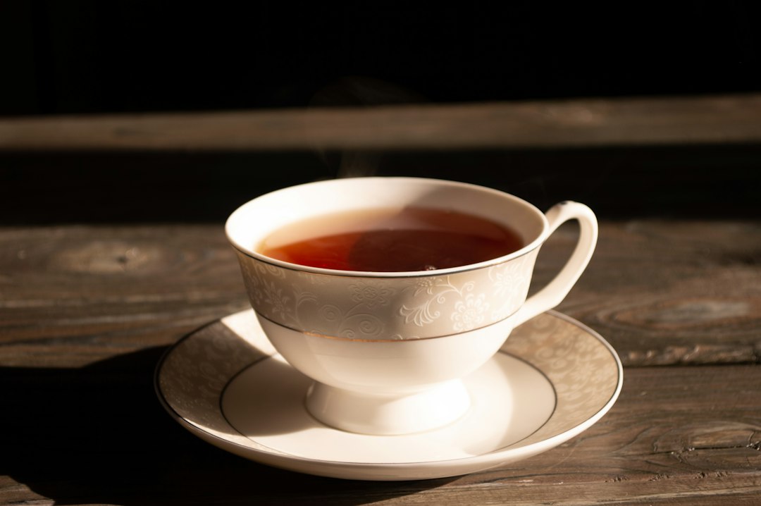 A warm cup of herbal tea on a wooden table